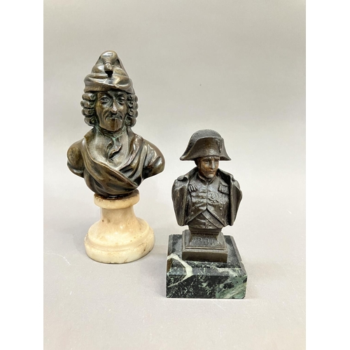 57 - A bronze bust of Voltaire on a swept marble base, 15cm high together with a metal bust bust of Napol... 