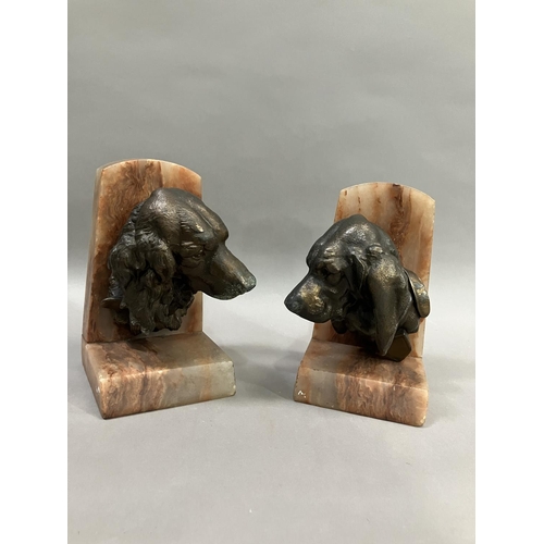 61 - A pair of art deco bronze effect spaniel and blood hound bookends mounted on alabaster, 20cm high