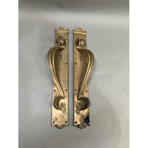 63 - A large pair of brass door handles with keyholes, registered number 553395, 53cm x 7.5cm