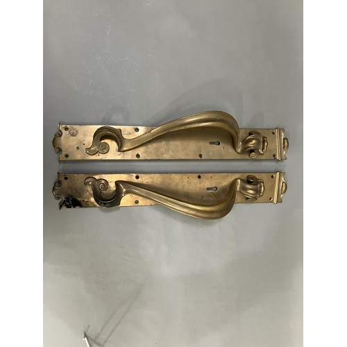 63 - A large pair of brass door handles with keyholes, registered number 553395, 53cm x 7.5cm