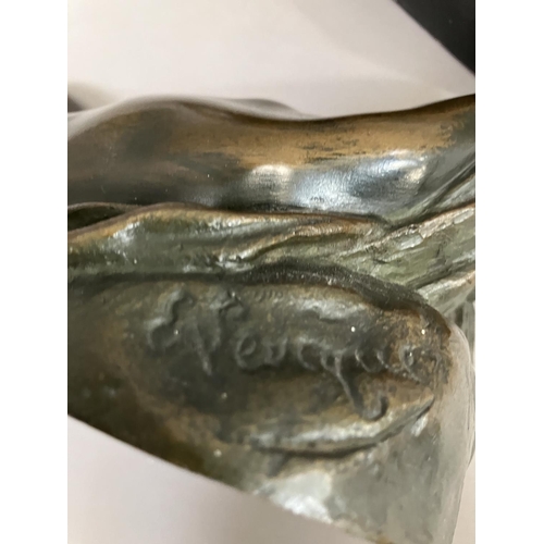 69 - A cast bronze model of a nude woman reclining, indistinctly signed on base 26cm long