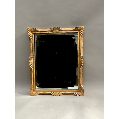 139 - A gilt framed wall mirror, 54cm x 77cm