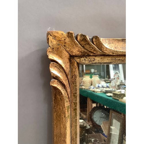 139 - A gilt framed wall mirror, 54cm x 77cm