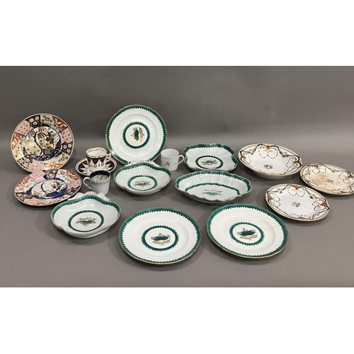 229 - An early to mid century part dessert service bordered in green with green and gilt floral motif to t... 