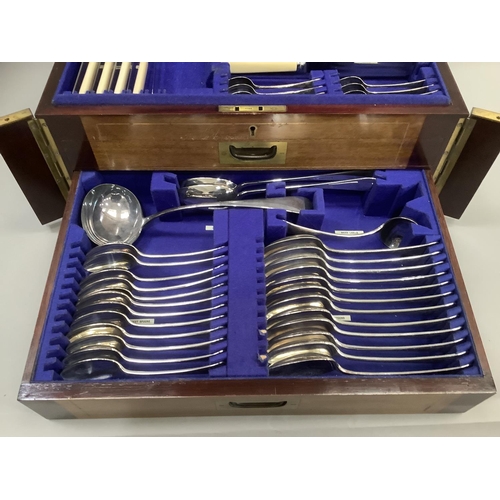 319 - An Edwardian mahogany chest canteen of silver plated cutlery by Dixons of Sheffield comprising nine ... 