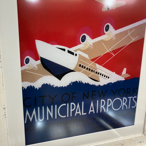 290 - A poster print Municipal airports together with various other poster prints, prints and an oval mirr... 