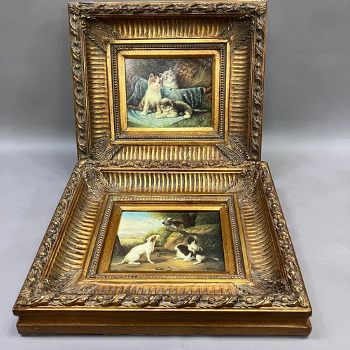 294 - Two prints of kittens and dogs with parrot in gilt frames measuring 29cm x 24cm