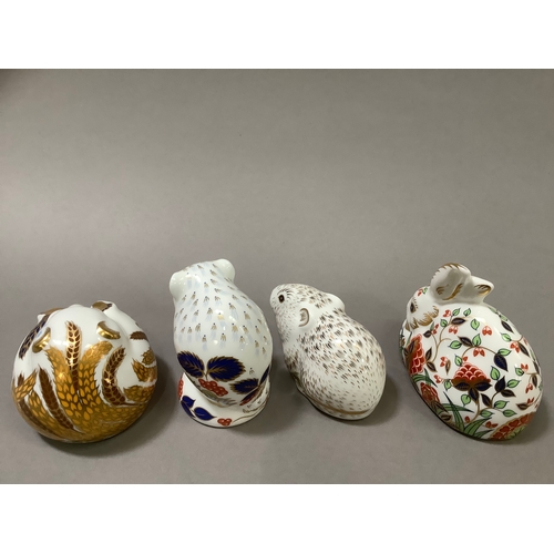 20 - Four Royal Crown Derby paperweights including a dormouse, harvest mouse, a vole and a rabbit, all wi... 