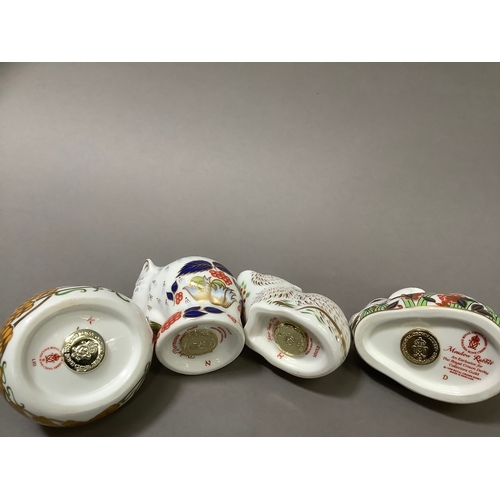 20 - Four Royal Crown Derby paperweights including a dormouse, harvest mouse, a vole and a rabbit, all wi... 