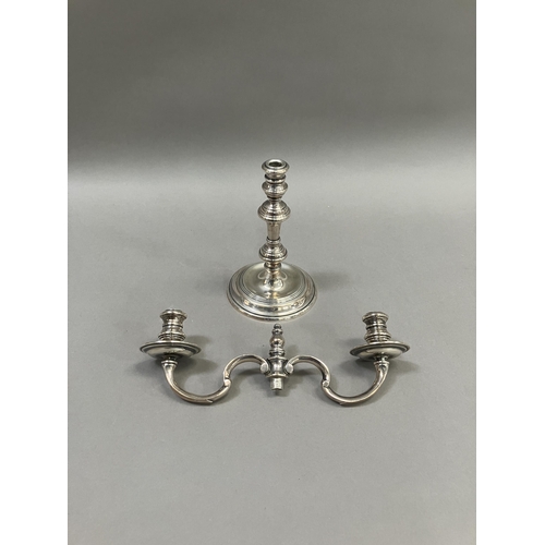 385 - An 18th century style silver two light candelabra with c-scroll arms and on a knopped column with di... 