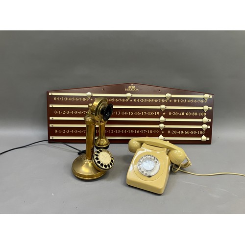 335 - Two vintage telephones and a scoreboard