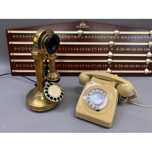 335 - Two vintage telephones and a scoreboard