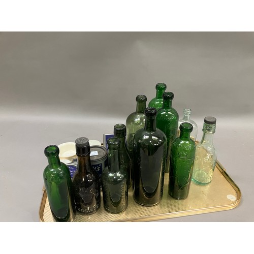 257 - A collection of Harrogate bottles including three in green glass marked with Harrogate and a crown b... 