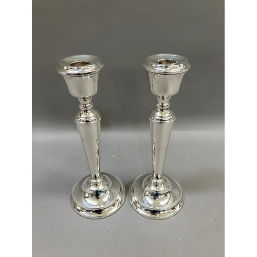 359 - A pair of Elizabeth II silver candlesticks, Birmingham, 1990 for A T Cannon Ltd, tapered stem over a... 