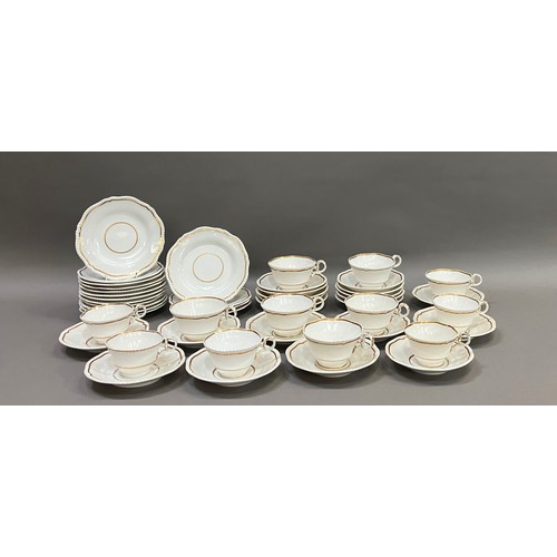 346 - A 19th century Spode part breakfast service with gadrooned rims highlighted in gilt comprising seven... 