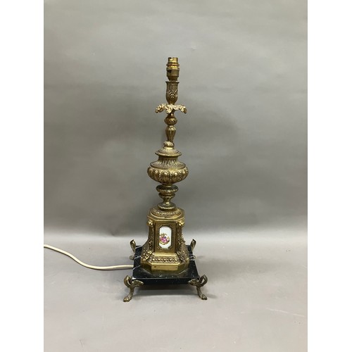 330 - A gilt metal moulded table lamp, the top rim moulded with grape vine, the base having painted cerami... 