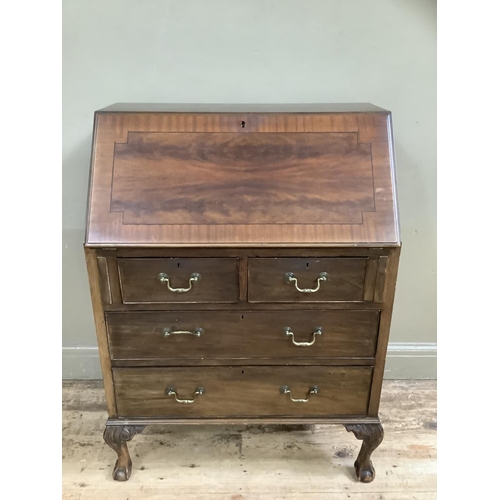 496 - A mahogany cross banded bureau, fall front over two long, two short drawers, 77cm wide