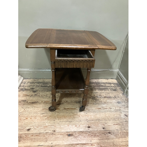 515 - An oak veneered telephone table together with a small drop leaf occasional table