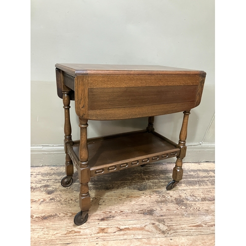 515 - An oak veneered telephone table together with a small drop leaf occasional table