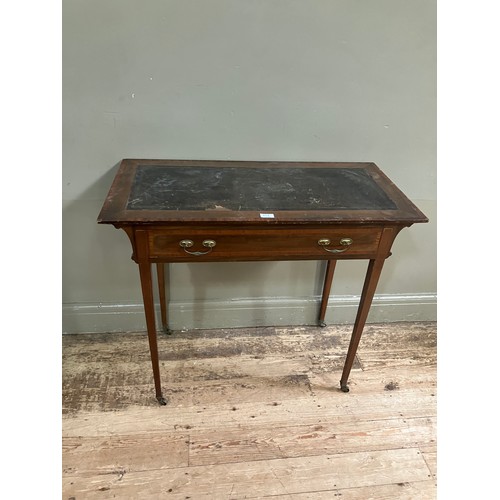 514 - An Edwardian mahogany and satinwood banded writing table having a Rexine incised writing surface ove... 