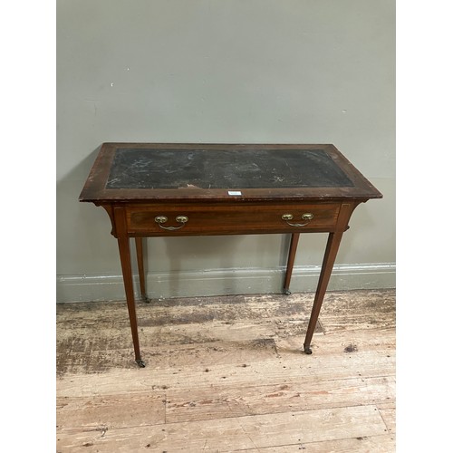 514 - An Edwardian mahogany and satinwood banded writing table having a Rexine incised writing surface ove... 