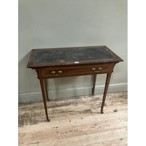 514 - An Edwardian mahogany and satinwood banded writing table having a Rexine incised writing surface ove... 