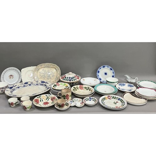 114 - A part pottery service painted with stylised flowers including tureen, plates in different sizes, tr... 