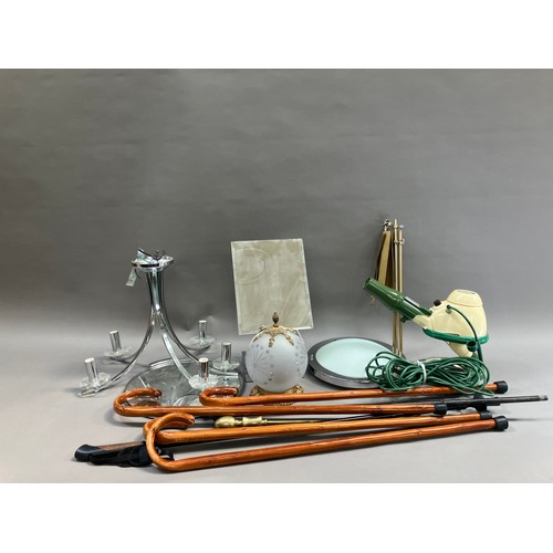 57 - Two light fittings, mirrored tray, toilet mirror, collection of walking sticks etc