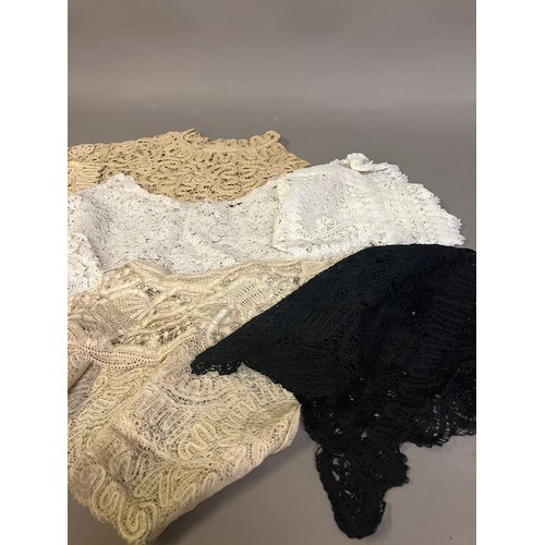 290 - Antique Lace: a selection of mainly Honiton bobbin lace, comprising a scarce black triangular shawl,... 