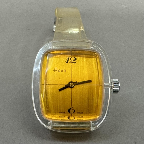 218 - An Agor ladies' manual wristwatch in an oval clear perspex case, Swiss lever movement, rectangular s... 