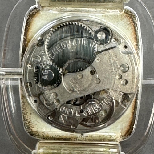 218 - An Agor ladies' manual wristwatch in an oval clear perspex case, Swiss lever movement, rectangular s... 