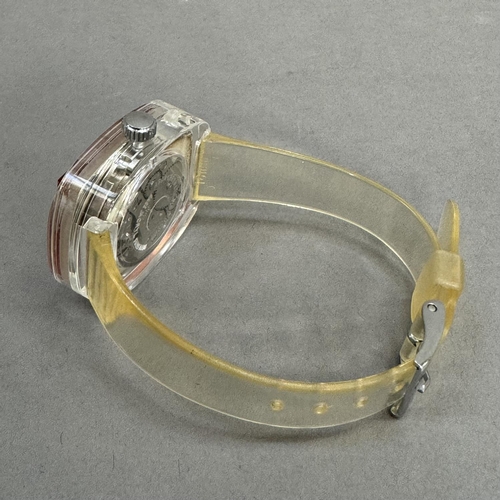 218 - An Agor ladies' manual wristwatch in an oval clear perspex case, Swiss lever movement, rectangular s... 