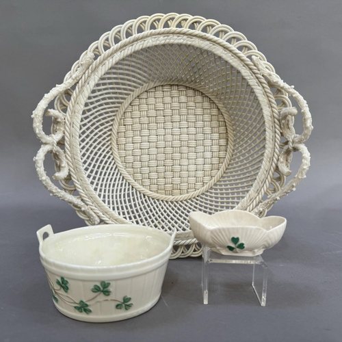 11 - A Belleek two handled circular basket with pierced rim, strap mark to underside Belleek Co Fermanagh... 