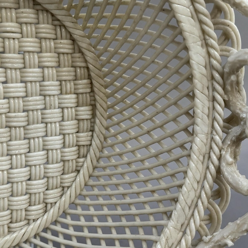 11 - A Belleek two handled circular basket with pierced rim, strap mark to underside Belleek Co Fermanagh... 