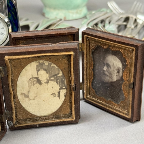 112 - A 1930s/1940s oak box and cover, two black and white portrait photographs in moulded Bakelite cases,... 