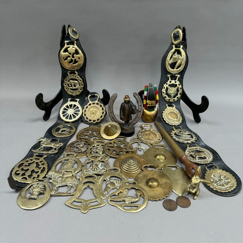 145 - A quantity of Victorian and later horse brasses together with a jewellery ring size gauge and a bras... 