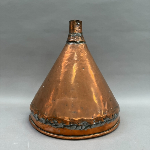 108 - A large copper funnel 32.5cm high