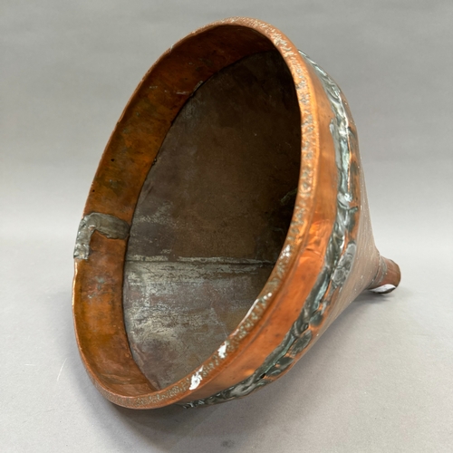 108 - A large copper funnel 32.5cm high