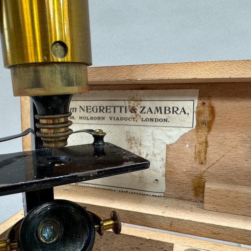 29 - A Negretti and Zambra microscope in wooden case