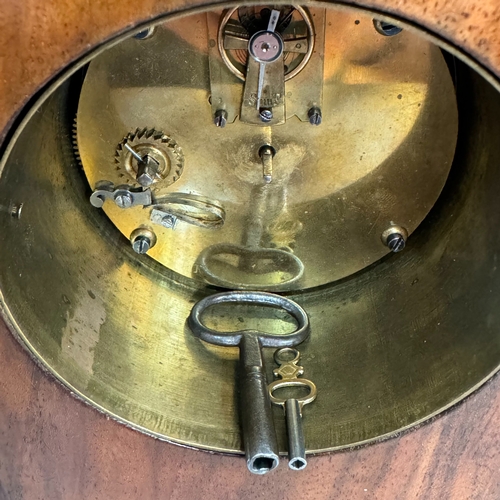 4 - A late 19th century walnut ebonised and gilt metal bracket clock having a white enamel dial and blac... 