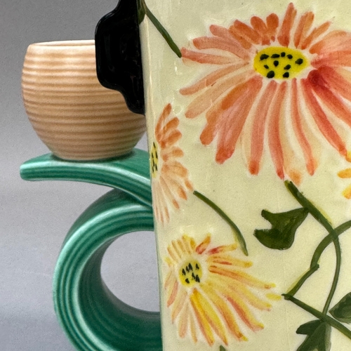 94 - An Art Deco vase by Charlotte Reid for Crown Ducal, slightly tapered cylindrical, painted with flowe... 