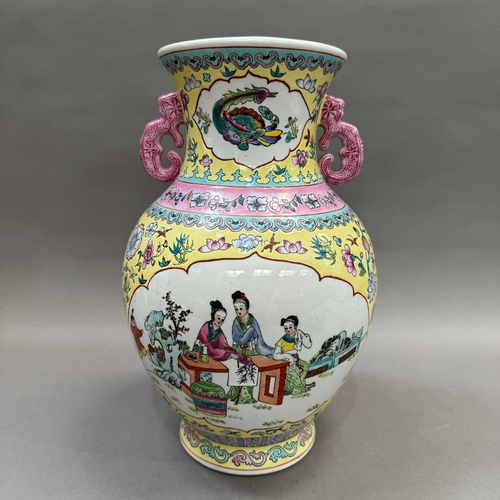 175 - A20th/21st century Chinese two handled vase painted with Bijin in a garden landscape in mirror shape... 