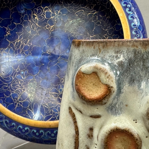 114 - A modern cloisonné bowl of circular shallow form, the blue enamel ground worked with flowers, 20cm t... 