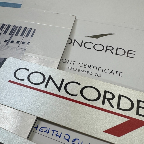 92 - Concorde memorabilia: a flight certificate dated 1996 presented with a booklet on Concorde, Concorde... 