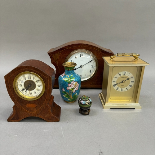 106 - Two Edwardian mantel clocks in mahogany and in oak together with a gilt metal carriage clock and a m... 