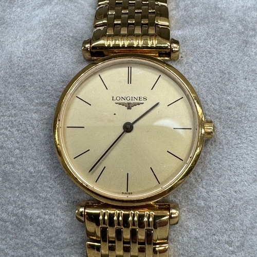 221 - A Longines lady's quartz wristwatch in gilt case no 31490544, matt gilt dial with black batons and h... 