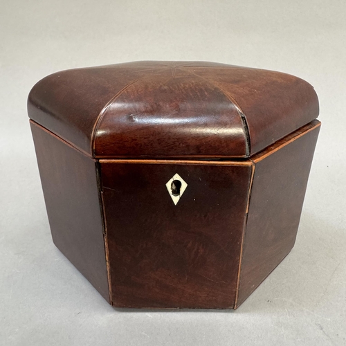 37 - A 19th century elongated hexagonal tea caddy with domed cover, boxwood stringing, bone escutcheon, l... 