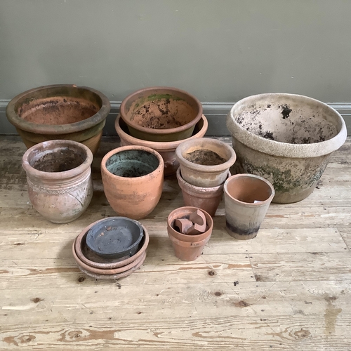 54 - A collection of terracotta plant pots measuring from 27.5cm high to 10cm together with a stone mix p... 