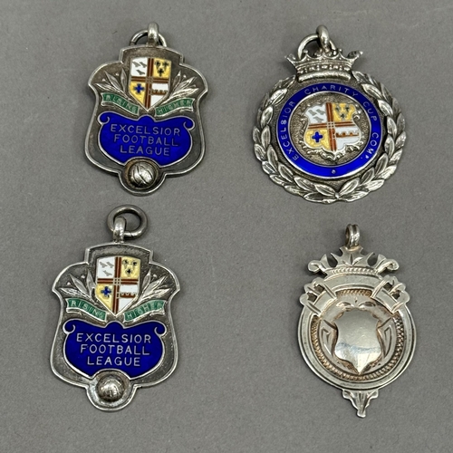 214 - Three enamelled silver football medals - two named to W St John for Croydon casuals F C 1933-34 and ... 