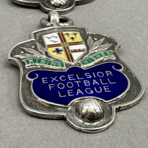 214 - Three enamelled silver football medals - two named to W St John for Croydon casuals F C 1933-34 and ... 